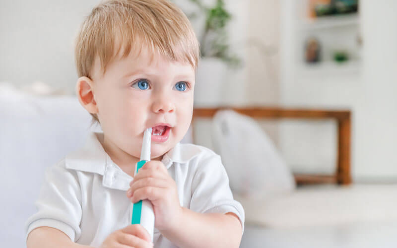 Child Brushing Teeth