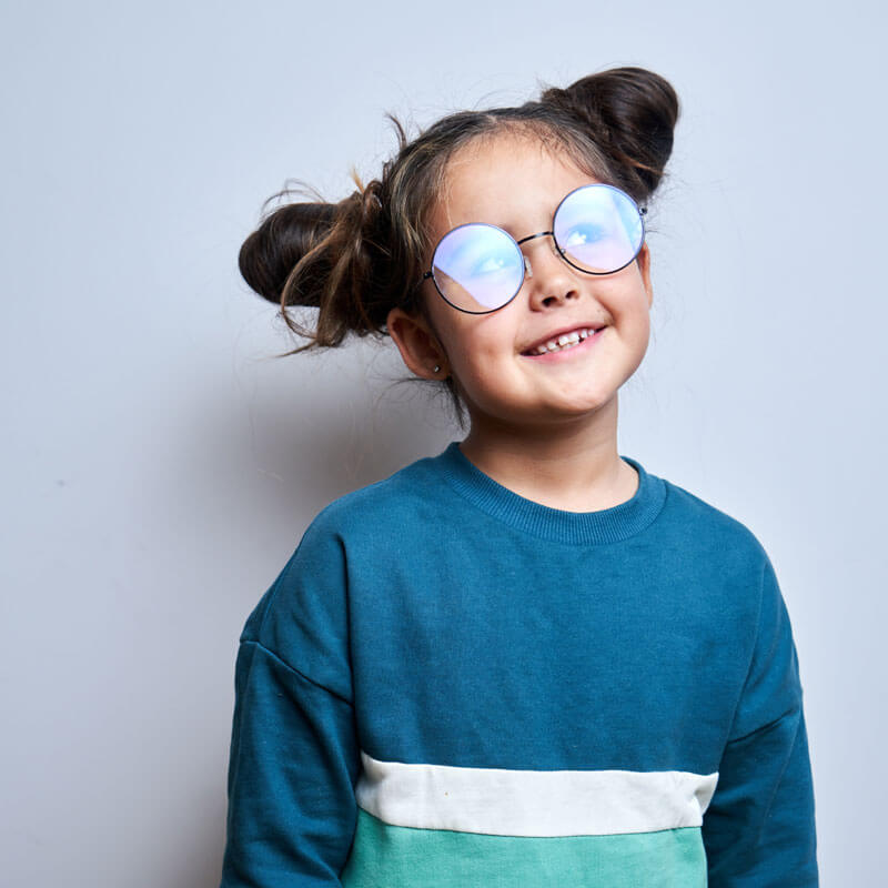 Smiling Child With Glasses