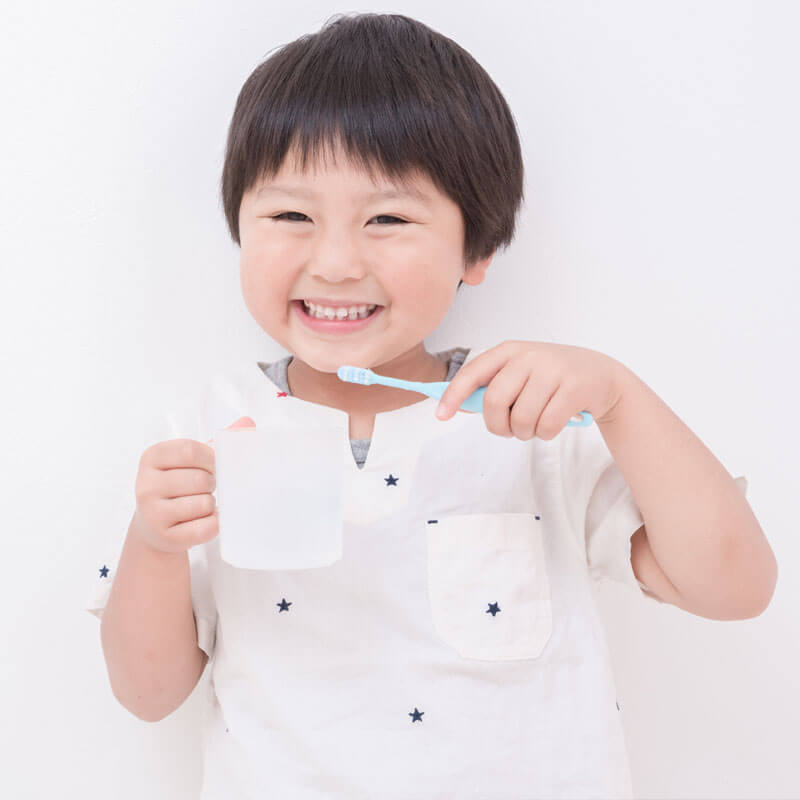 Child Brushing Teeth