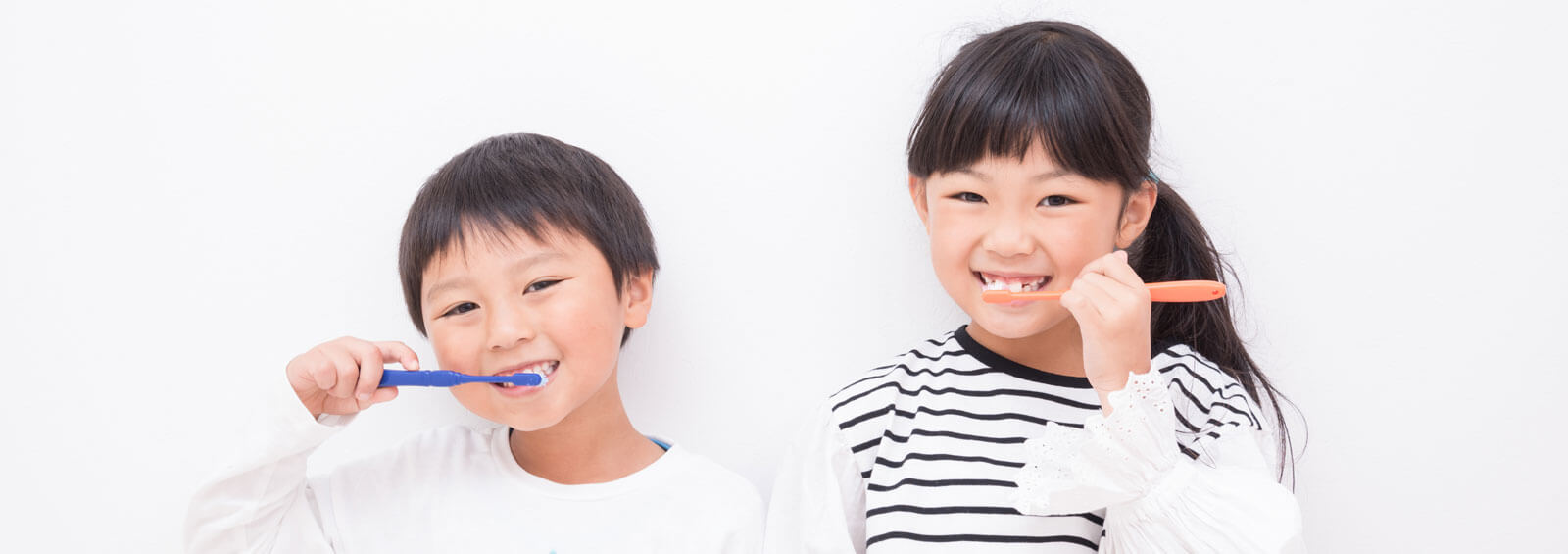 Children Brushing Teeth